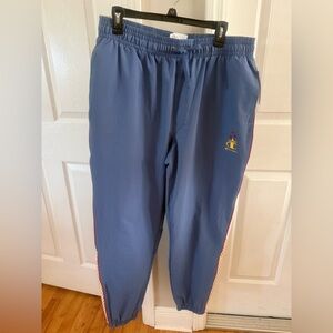 Champion Blue Track Pants with Red Star & Yellow Logo